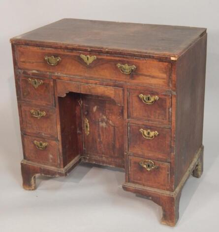 A mid 18thC walnut kneehole desk