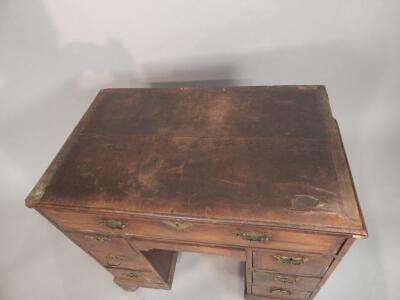 A mid 18thC walnut kneehole desk - 2