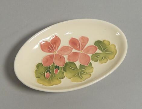 A modern Moorcroft Geranium pattern oval pin tray or dish