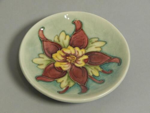 A Moorcroft Columbine pattern circular pin tray