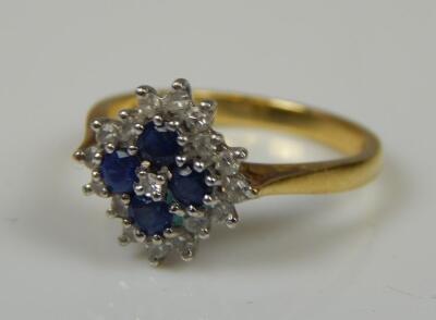 An 18ct gold sapphire and diamond dress ring