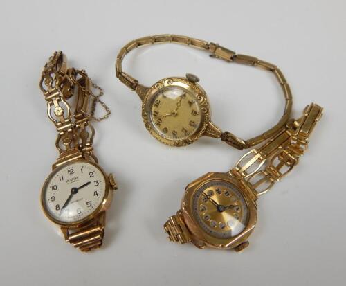 Three wristwatches