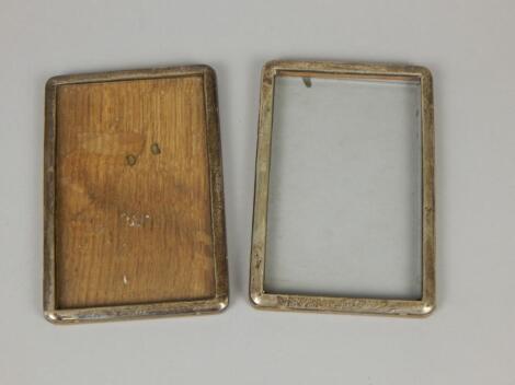 A pair of 20thC silver mounted rectangular photograph frames