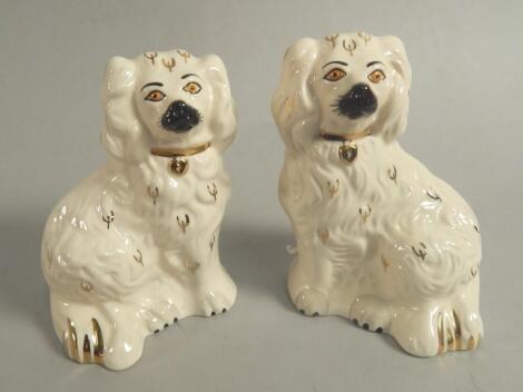 A pair of Royal Doulton pottery spaniels