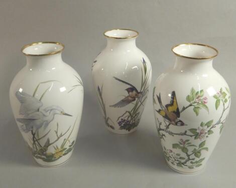 A set of three Franklin Mint porcelain vases by Basil Ede