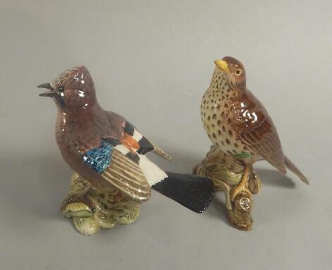 Two Beswick birds