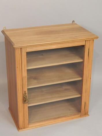 A late Victorian stripped walnut display cabinet