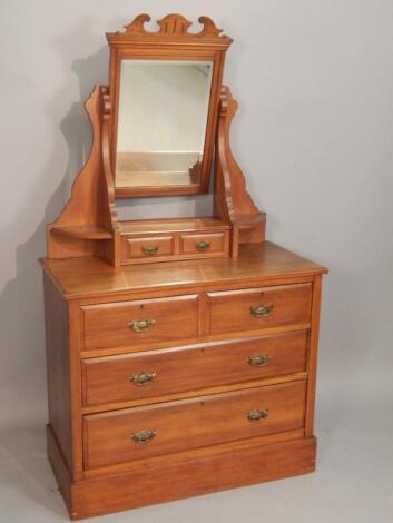 A late Victorian pale walnut dressing table