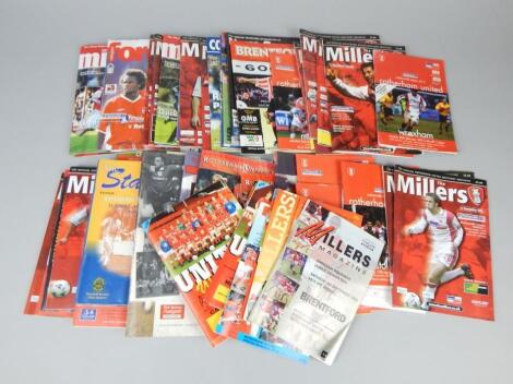 A quantity of mainly Rotherham United related football programmes