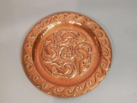 A late 19thC / early 20thC copper Arts and Crafts style charger