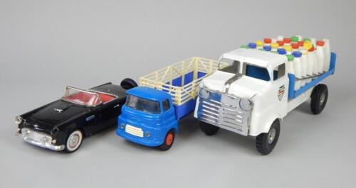 Three die-cast vehicles