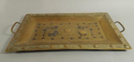 An Indian brass two handled tray