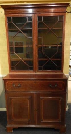 A 19thC mahogany and satinwood cross banded secretaire bookcase