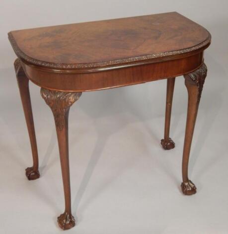 A 20thC reproduction mahogany card table