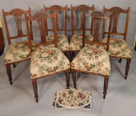 A set of six Edwardian oak dining chairs