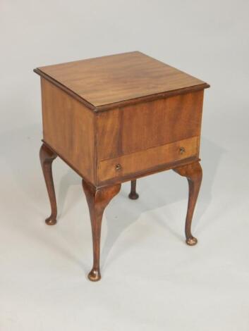 A 1920's figured mahogany work table