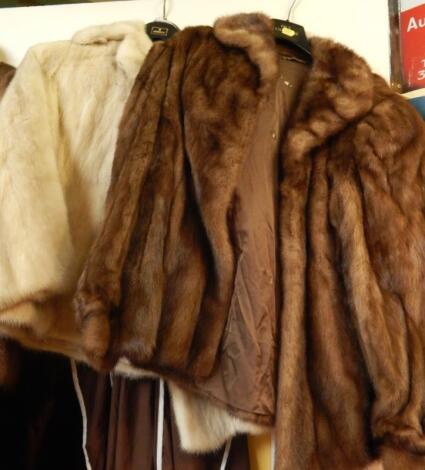 Two half length fur coats