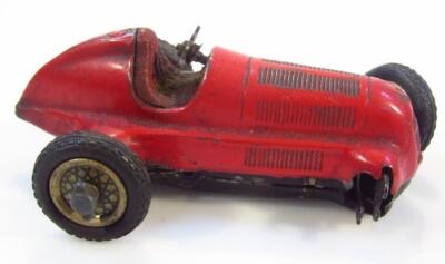 A mid-20thC Schuco Studio red pained tin plate racing car - 2