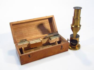 A late 19thC miniature brass microscope