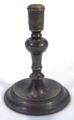 An 18thC pewter candlestick