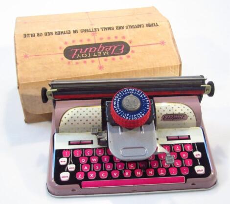 A 20thC Mettoy Elegant tin plate typewriter