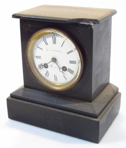 A Victorian black slate mantel clock