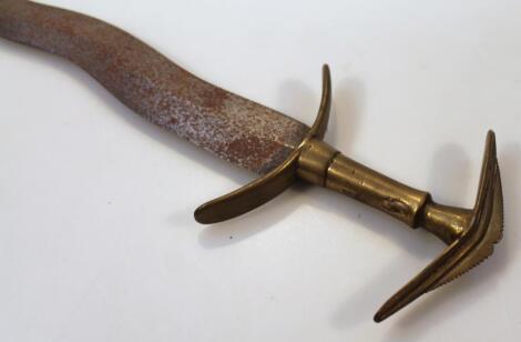 An early 20thC eastern curved bladed short sword or dagger