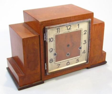 A mid-20thC walnut cased Art Deco mantel clock