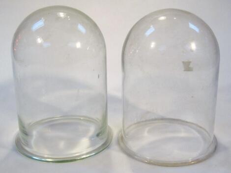 Two various early 20thC glass domes