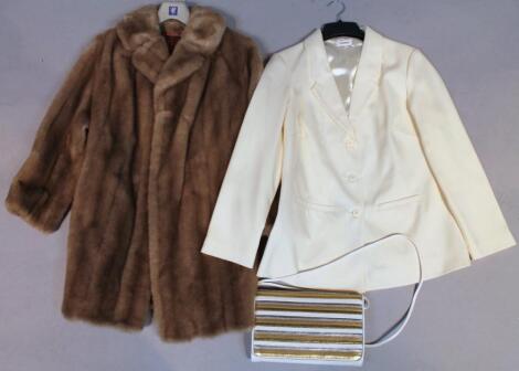 A faux fur ladies three quarter length jacket