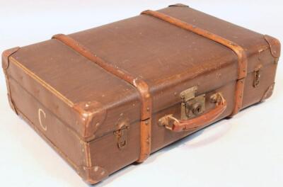 An early 20thC pressed leather travel case