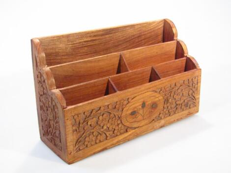 An early 20thC hardwood desk tidy