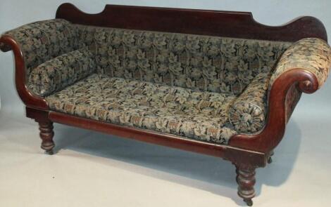 A late William IV mahogany scroll arm settee