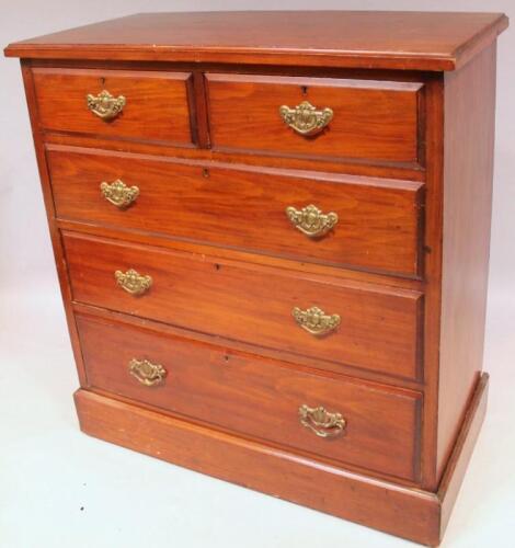 An Edwardian stained walnut chest