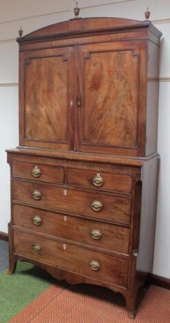 A George III mahogany bookcase on chest