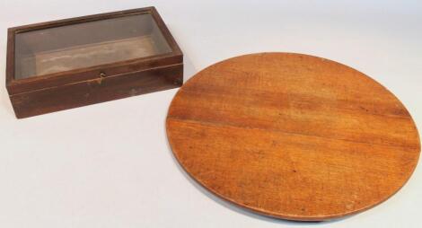 An early 20thC stained oak table display cabinet