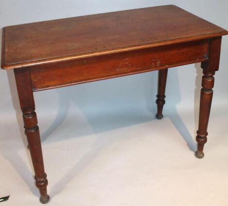 A Victorian mahogany side table