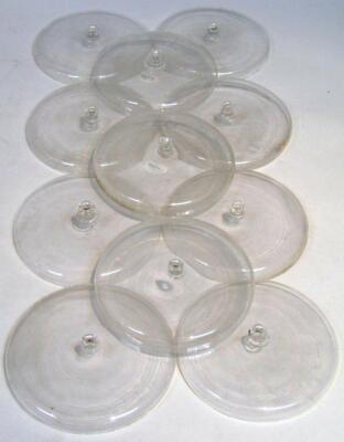 Eleven early 20thC glass lids