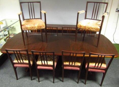 A 1960's matched rosewood dining room suite