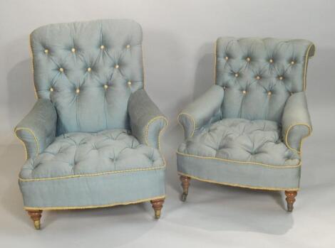 A near pair of Victorian walnut armchairs