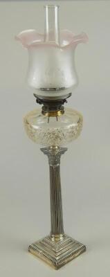 An Edwardian silver oil lamp