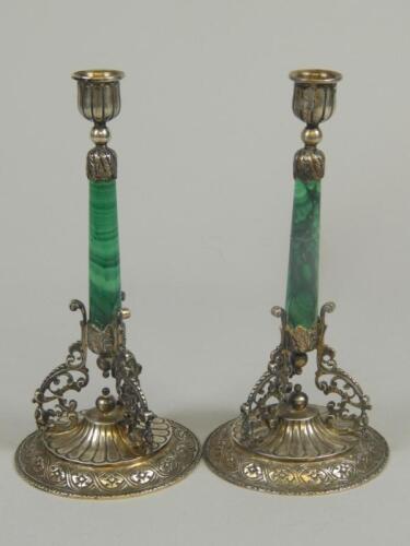 A pair of Asprey & Co silver mounted candlesticks