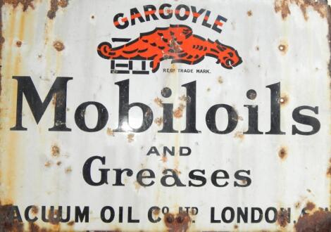 A Gargoyle Mobile Oil and Grease Vacuum Oil Company Ltd London enamel sign