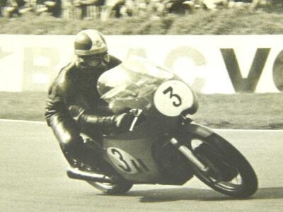 Black and white photographs from the 1960's of motor cycle racing. - 6