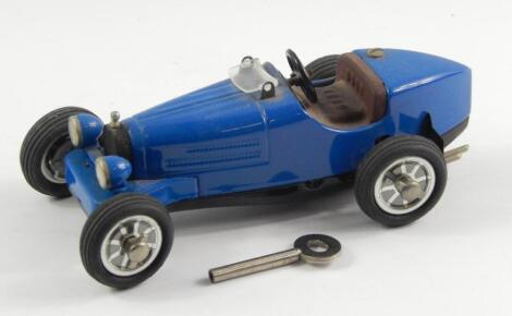 A modern Shuco Studio IV Bugatti 35B clockwork model car.