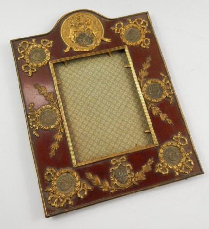 A Victorian mahogany and gilt brass strut photograph frame