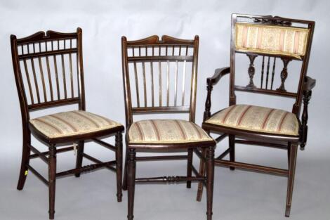 A Victorian rosewood and ivory inlaid bedroom armchair