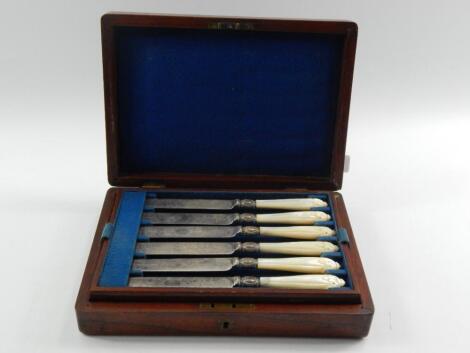 A set of six Victorian plated fruit knives and forks