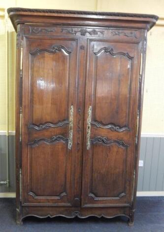 An 18thC French chestnut armoire