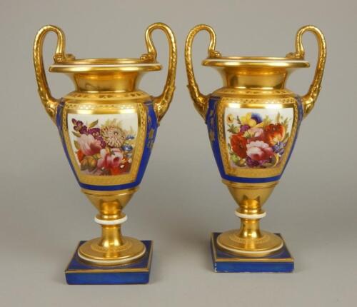 A pair of 19thC Paris porcelain two handled vases